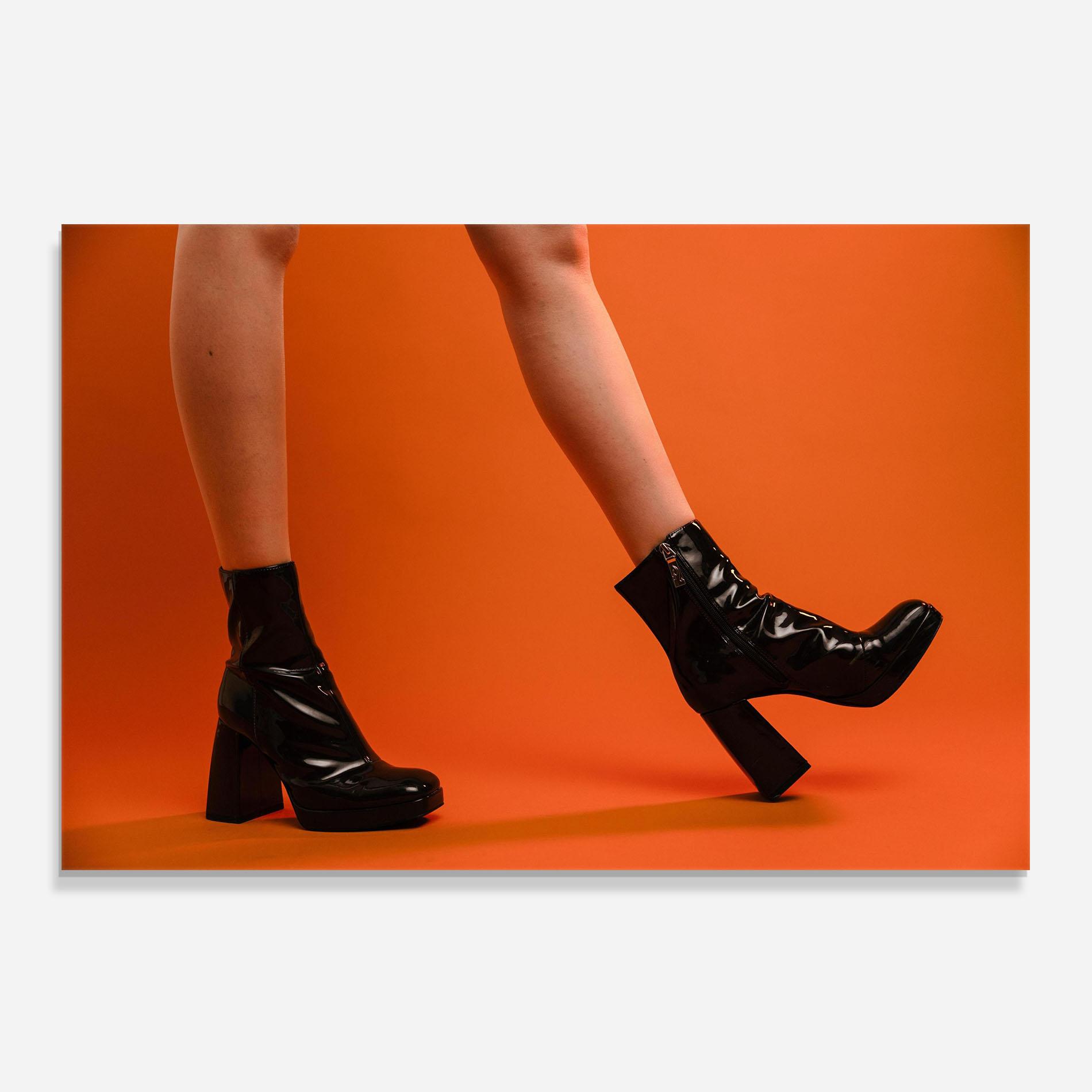 Küchenrückwand Glas Black Boots On Orange mockup 0