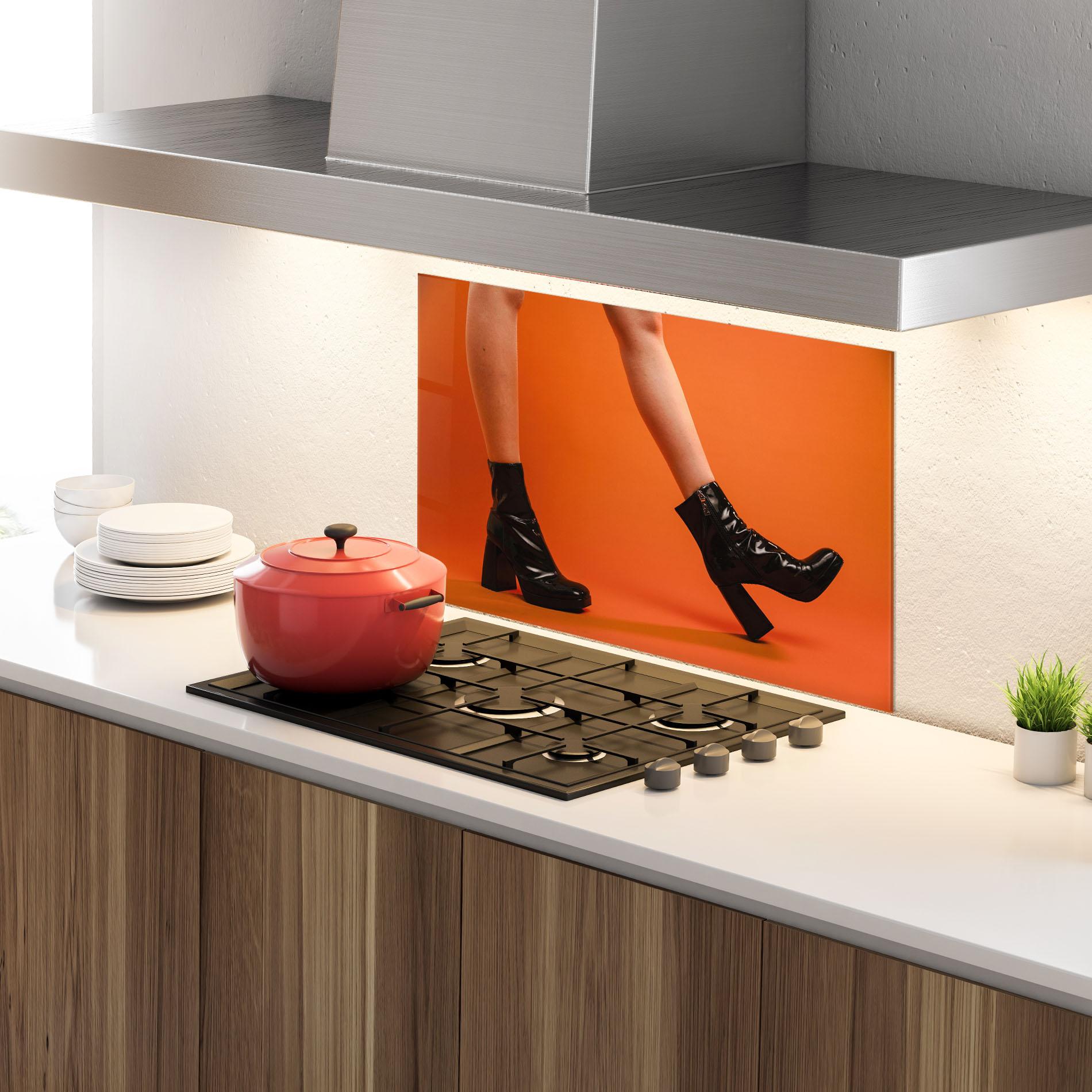Küchenrückwand Glas Black Boots On Orange mockup 4