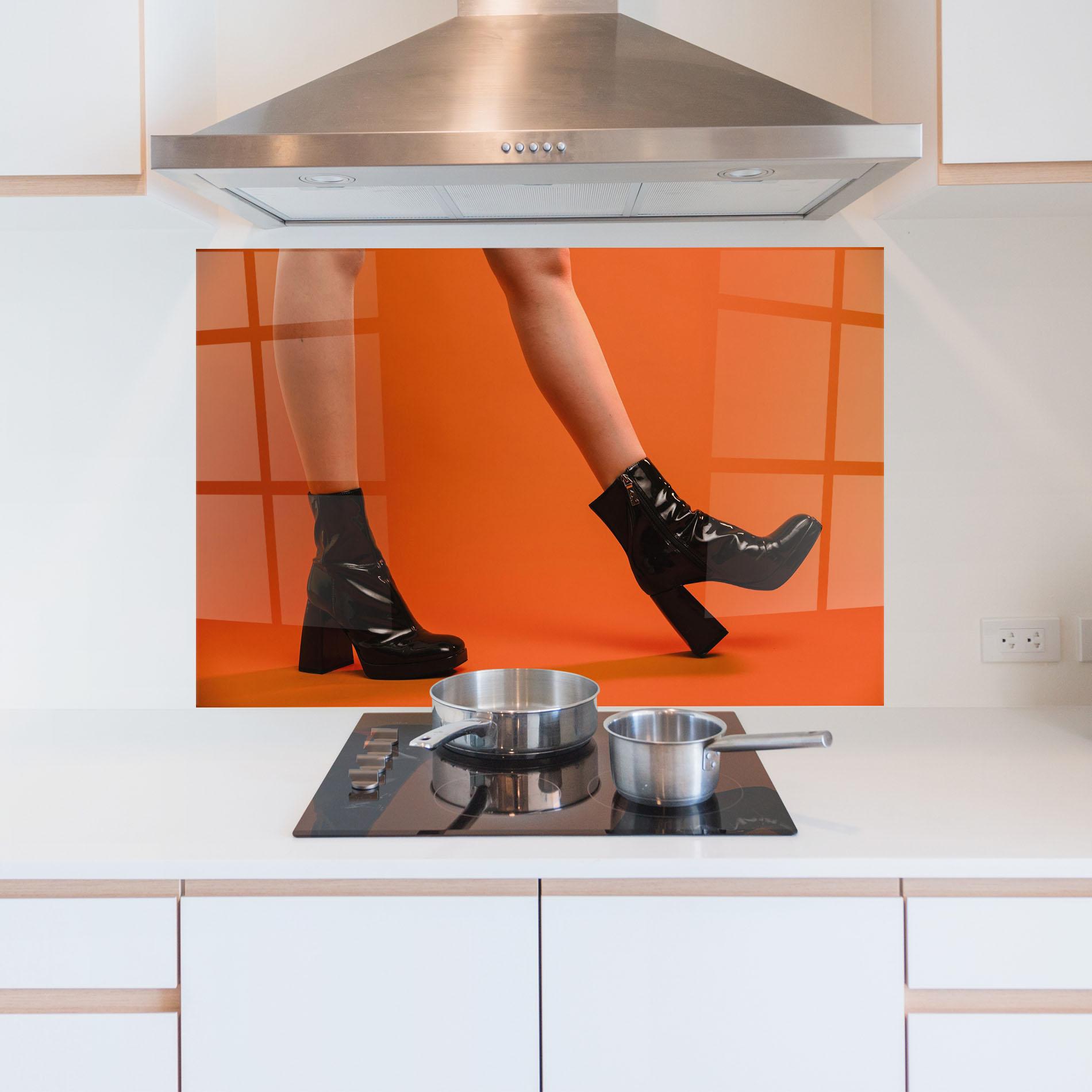Küchenrückwand Glas Black Boots On Orange mockup 5