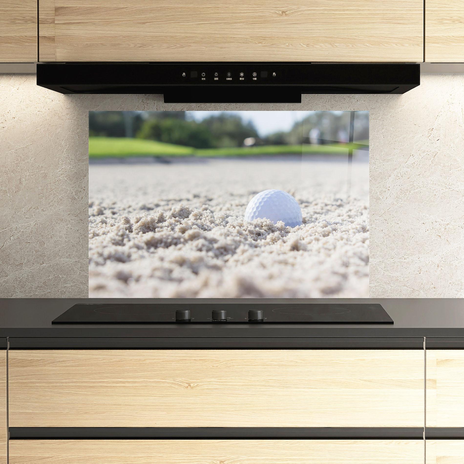 Küchenrückwand Glas Golf Ball In Sand mockup 3