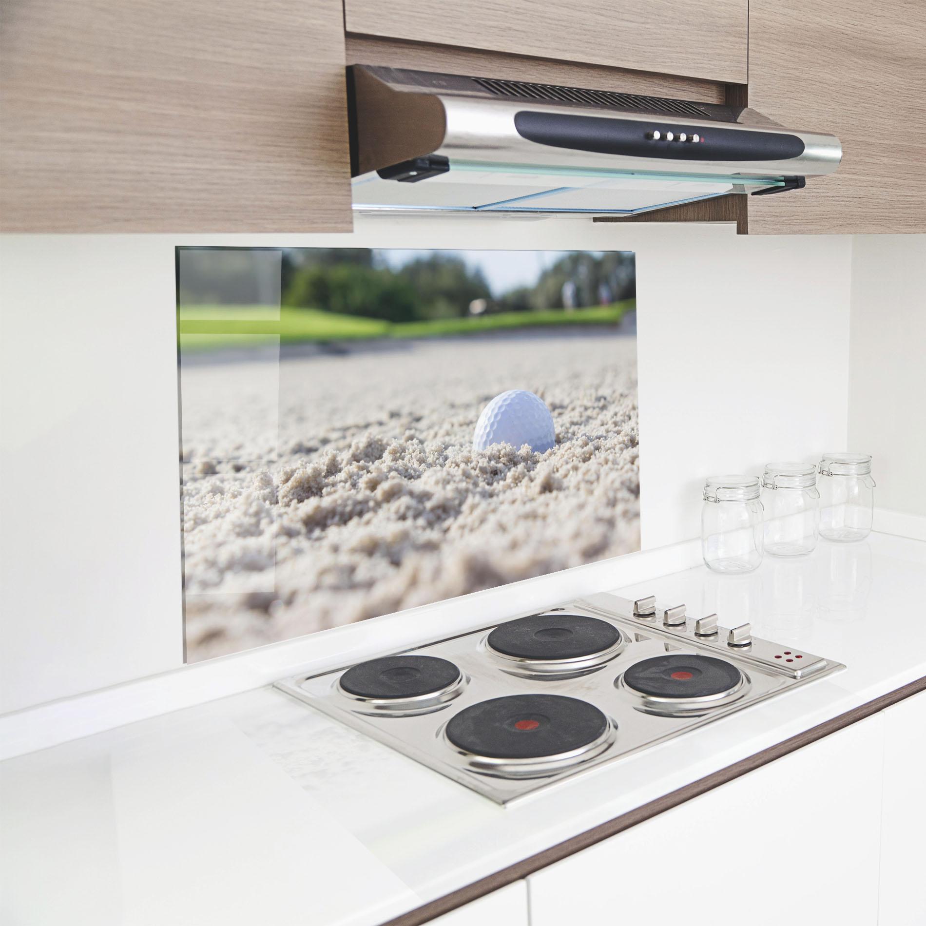 Küchenrückwand Glas Golf Ball In Sand mockup 8