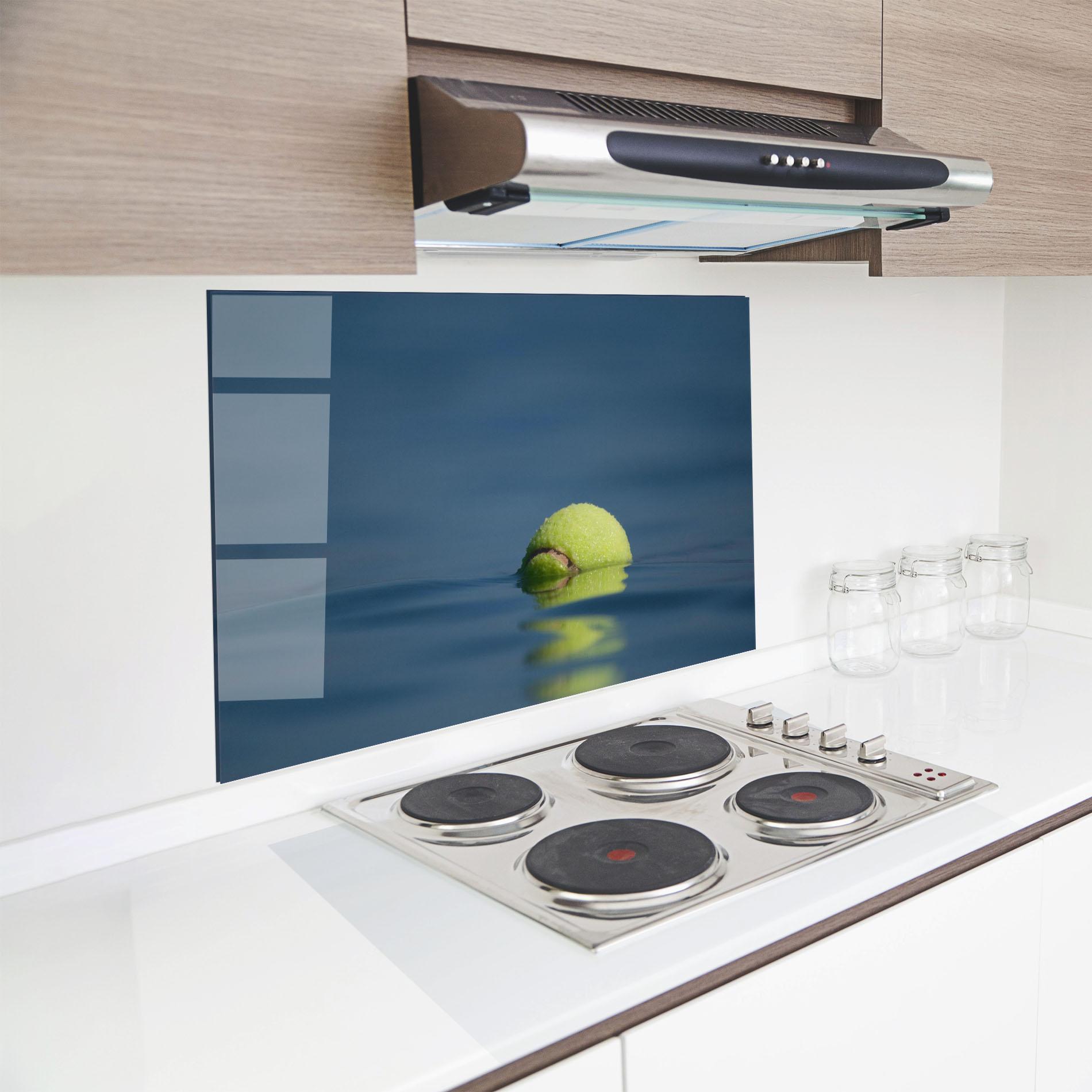 Küchenrückwand Glas Tennis Ball In Water mockup 8