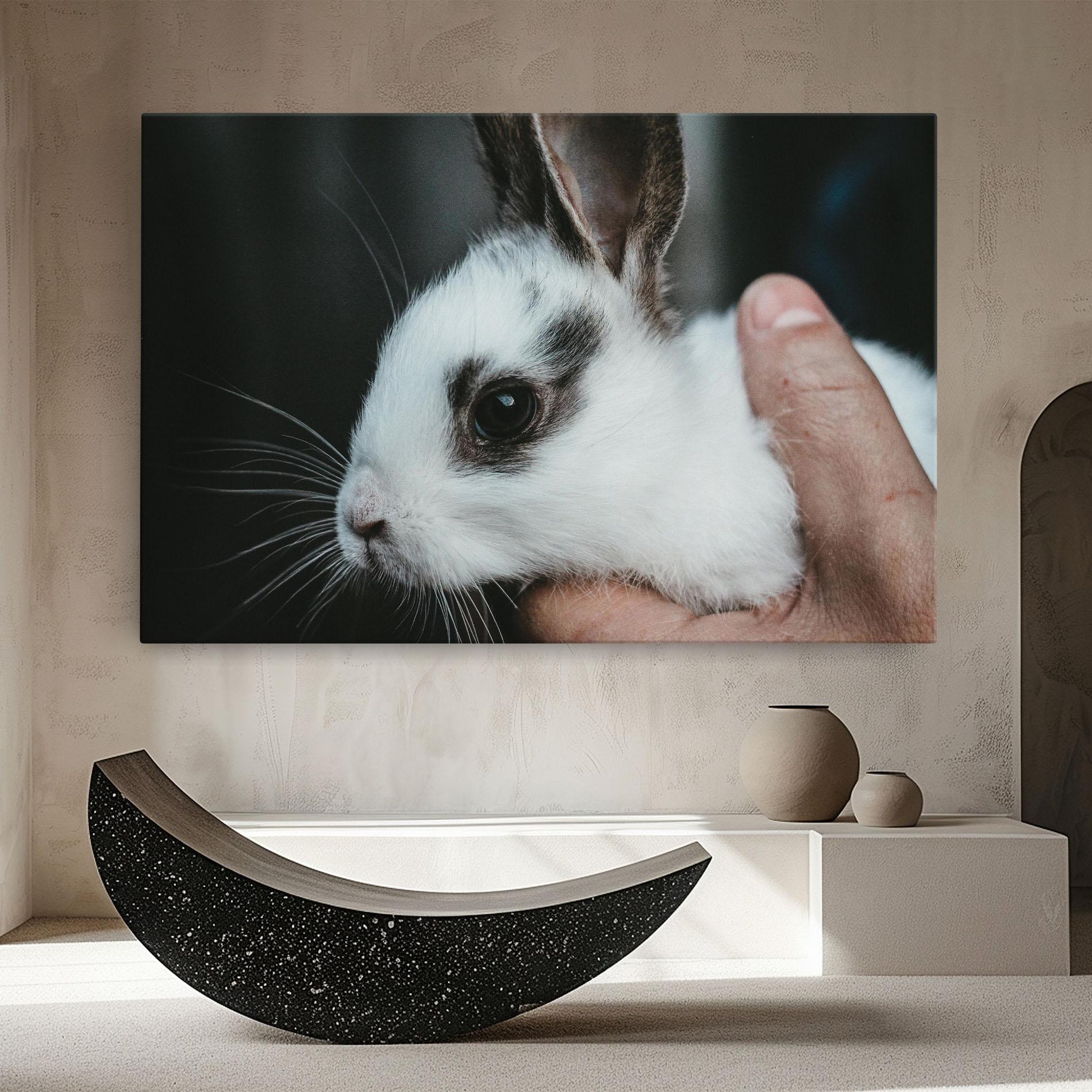 Leinwandbild Holding Cute Bunny mockup 8