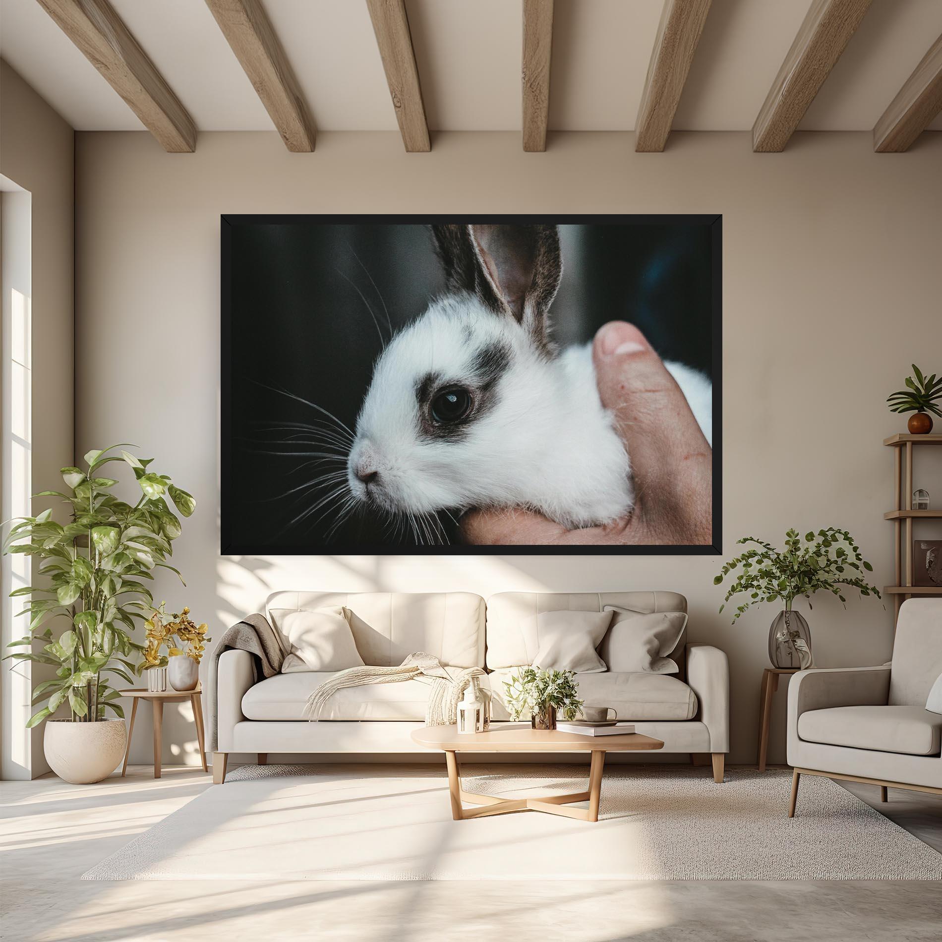 Leinwandbild Holding Cute Bunny mockup 6