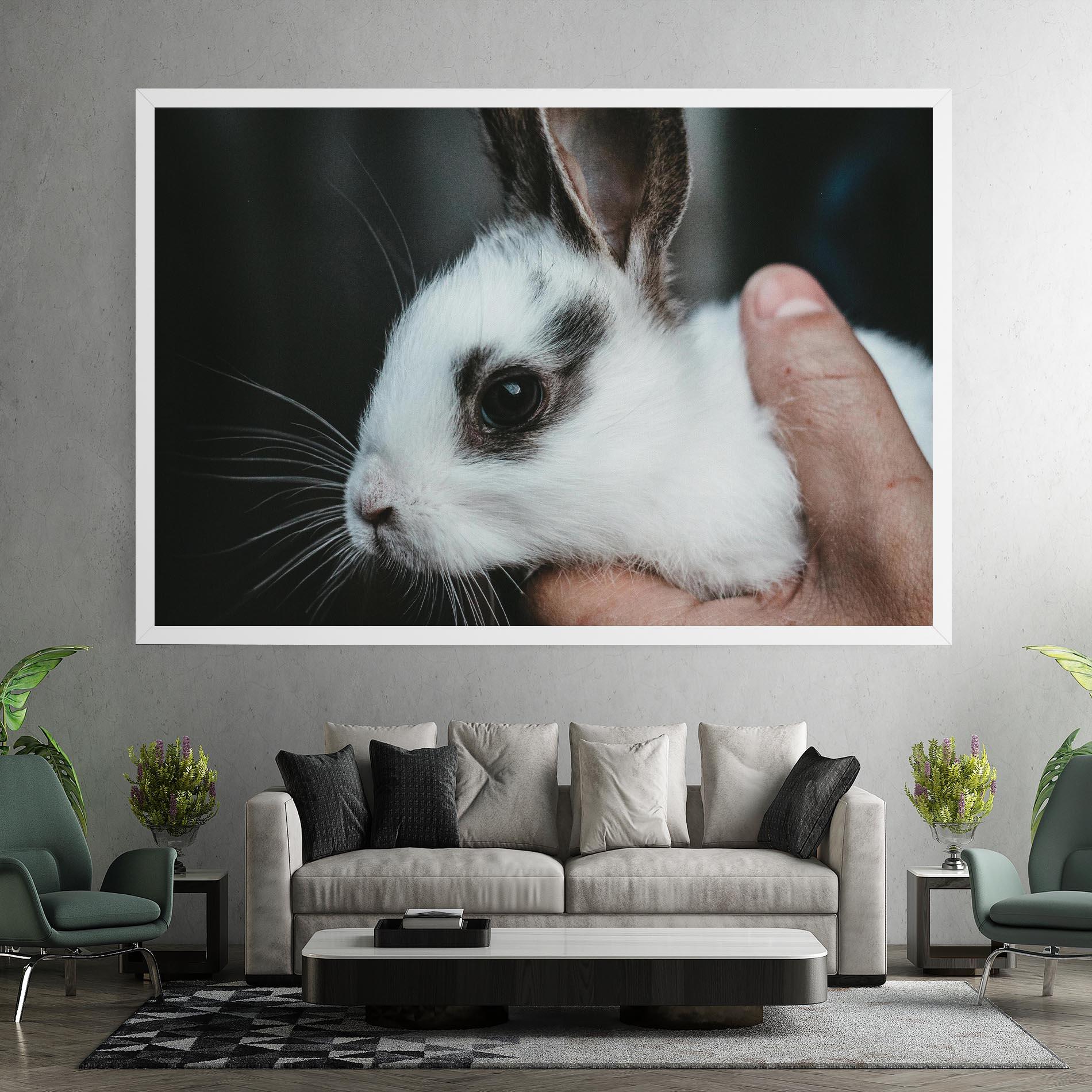 Leinwandbild Holding Cute Bunny mockup 7