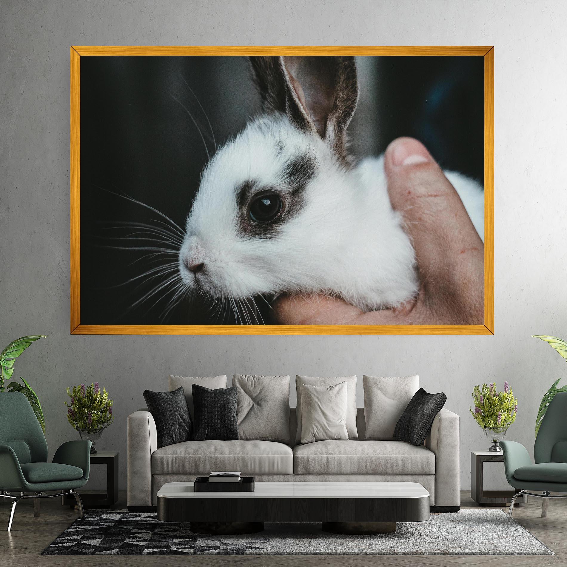 Leinwandbild Holding Cute Bunny mockup 7