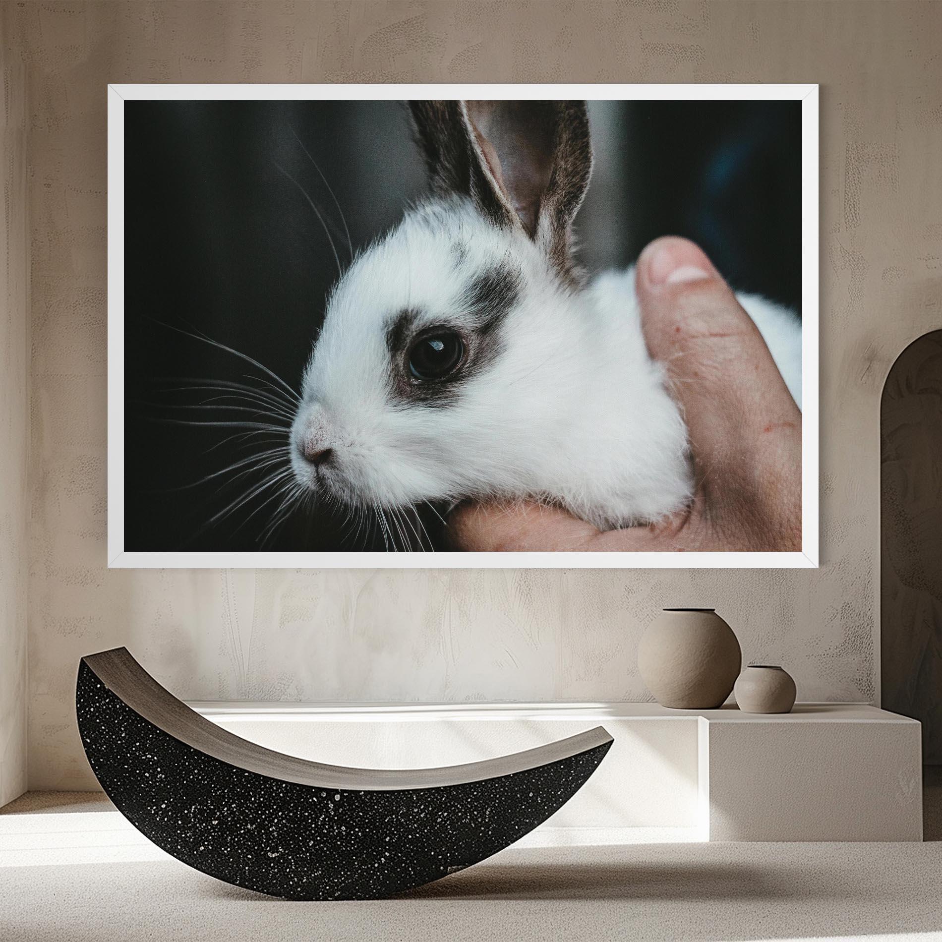 Leinwandbild Holding Cute Bunny mockup 8