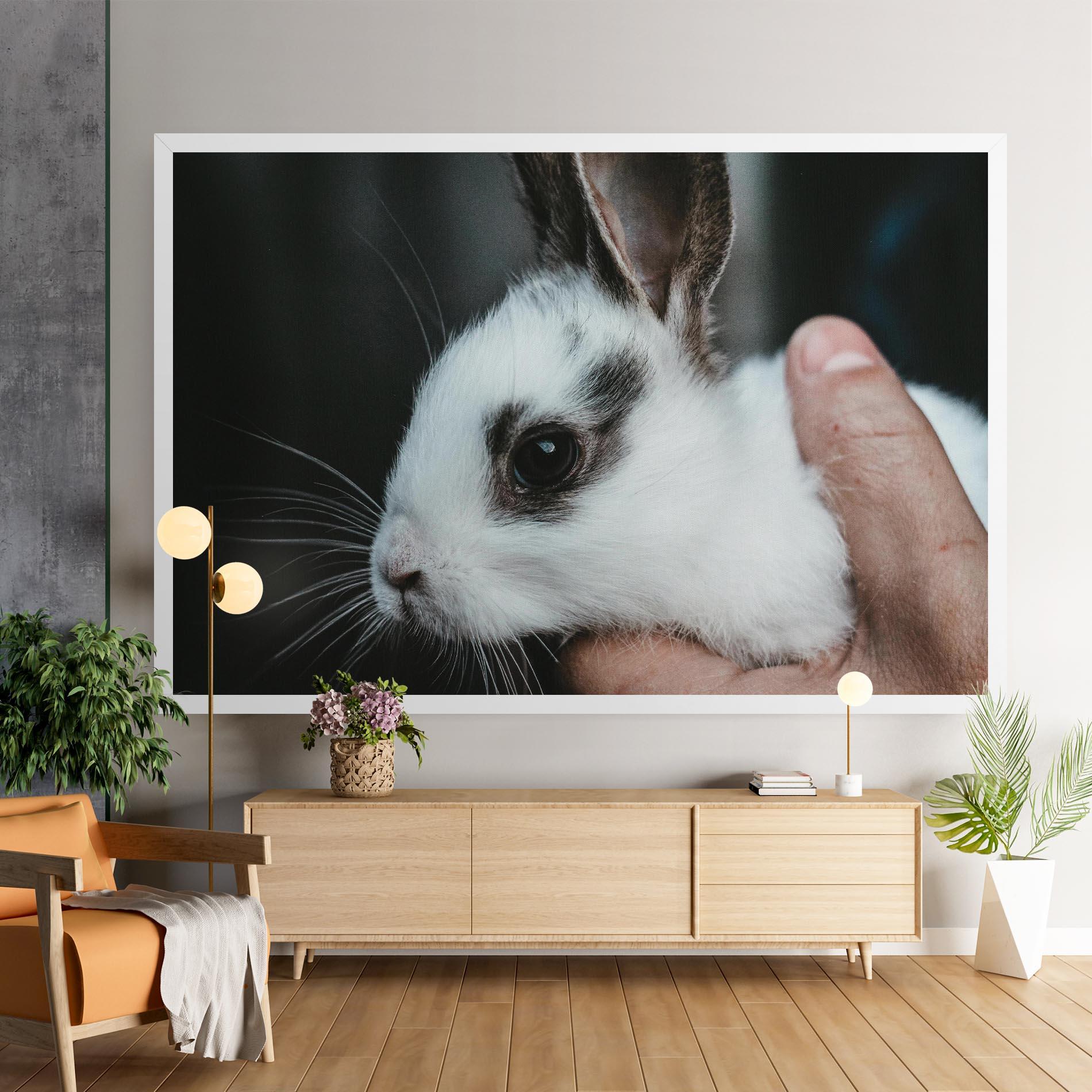 Leinwandbild Holding Cute Bunny mockup 9