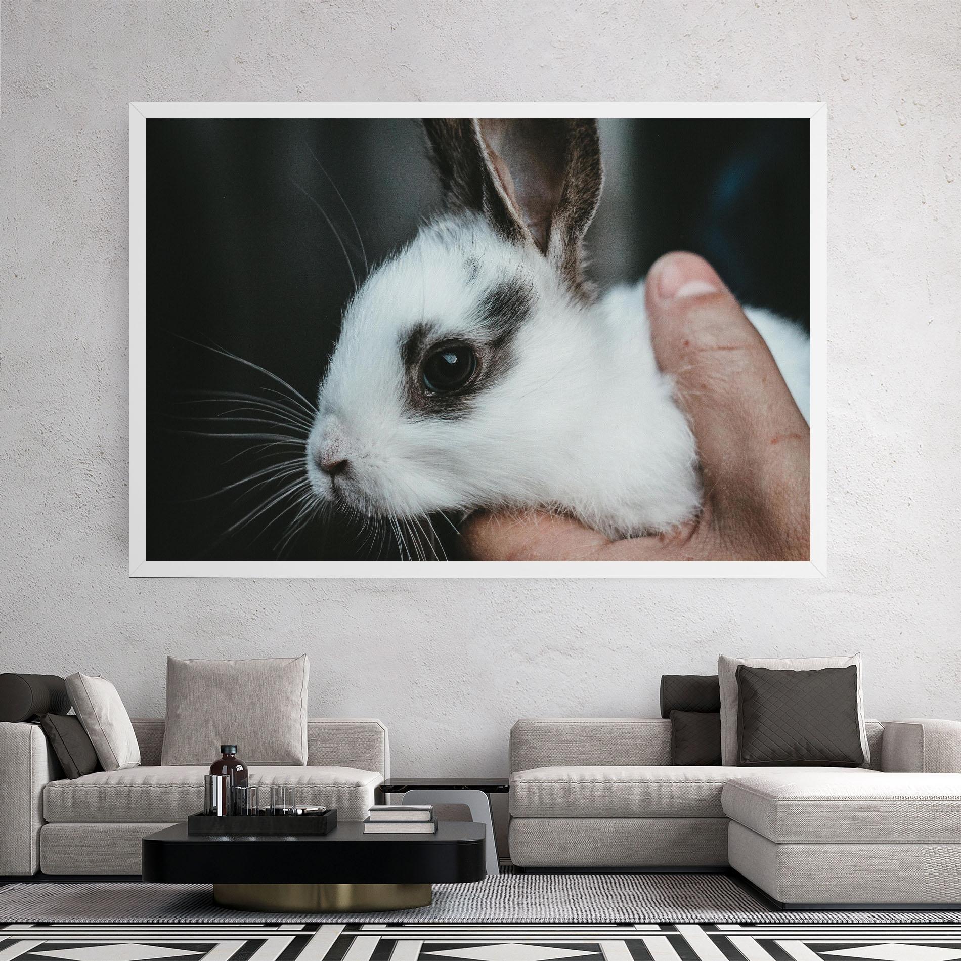 Leinwandbild Holding Cute Bunny mockup 2