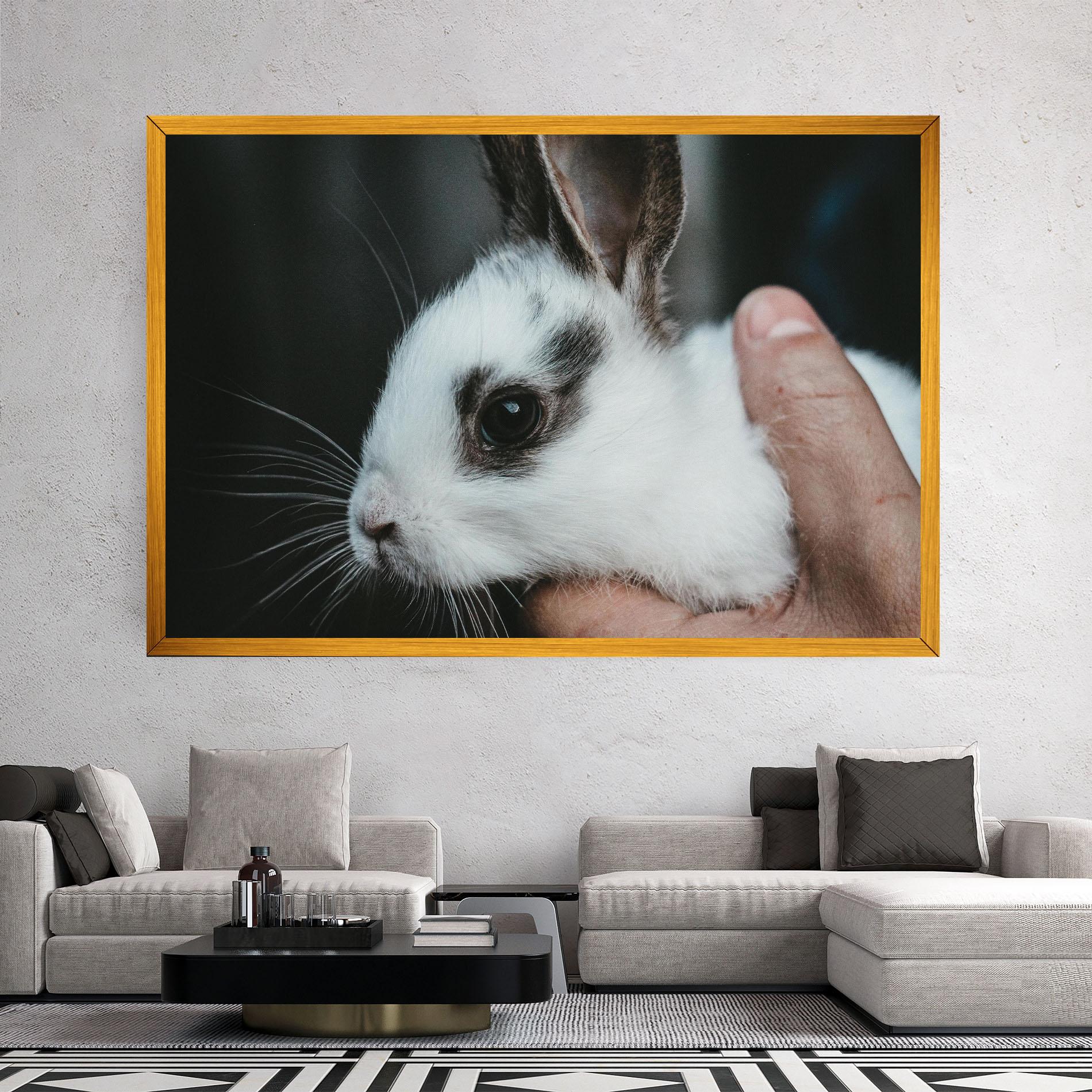 Leinwandbild Holding Cute Bunny mockup 2