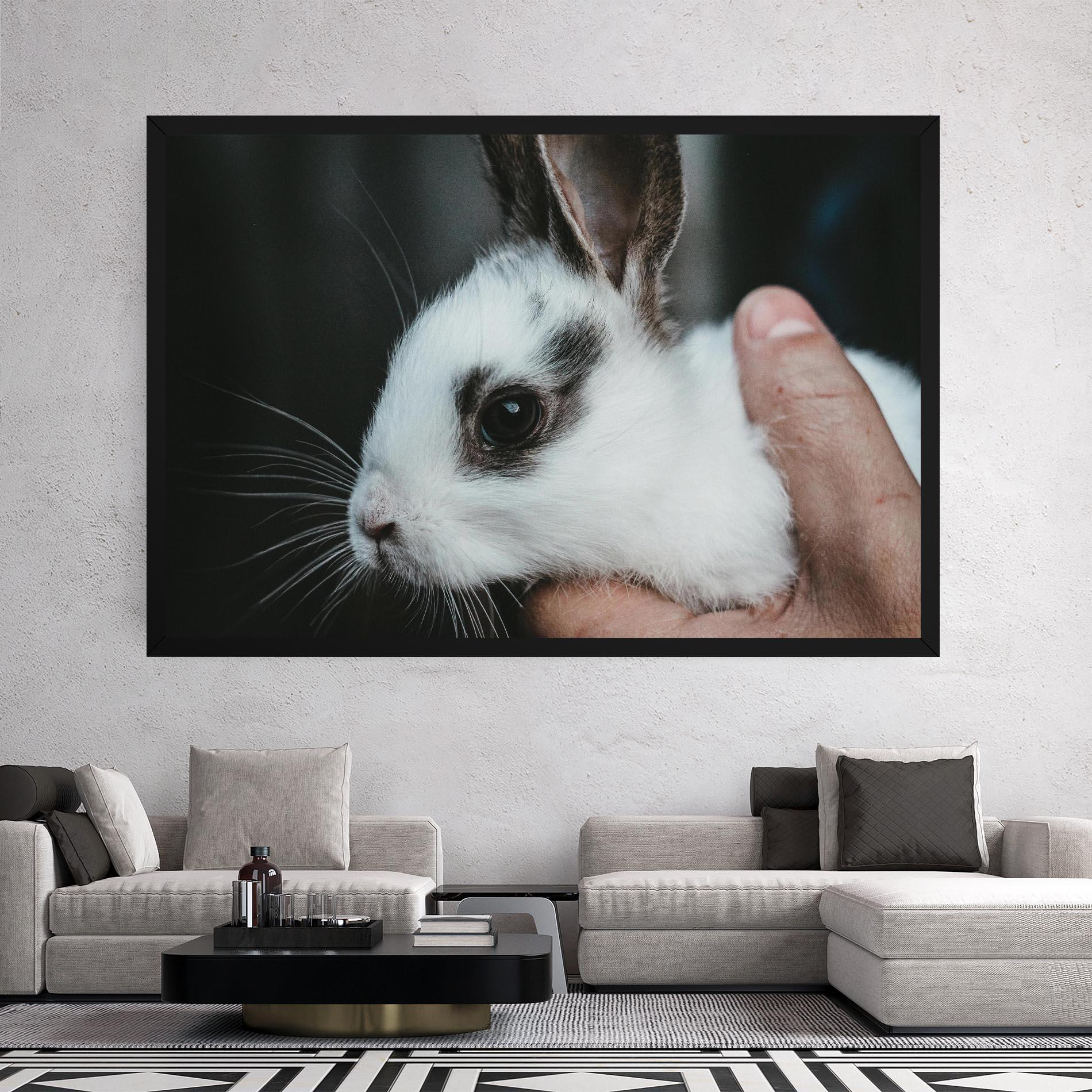 Leinwandbild Holding Cute Bunny mockup 2