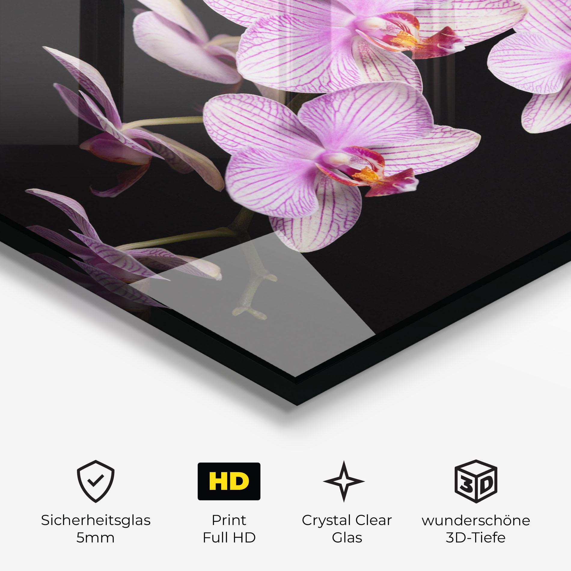 Glasbild Beautiful Orchids On Black mockup 3