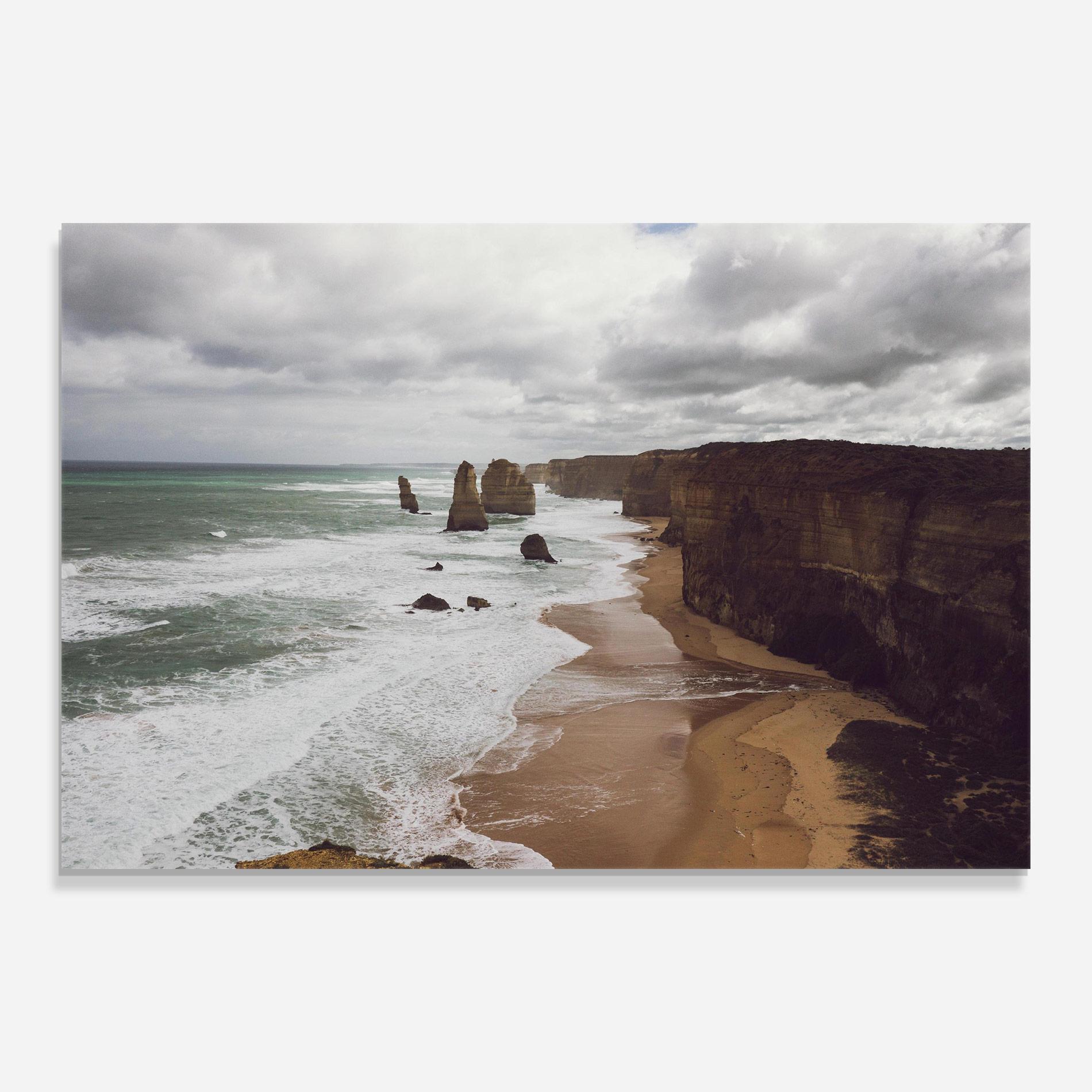 Glasbild Grey Clouds Beach mockup 0