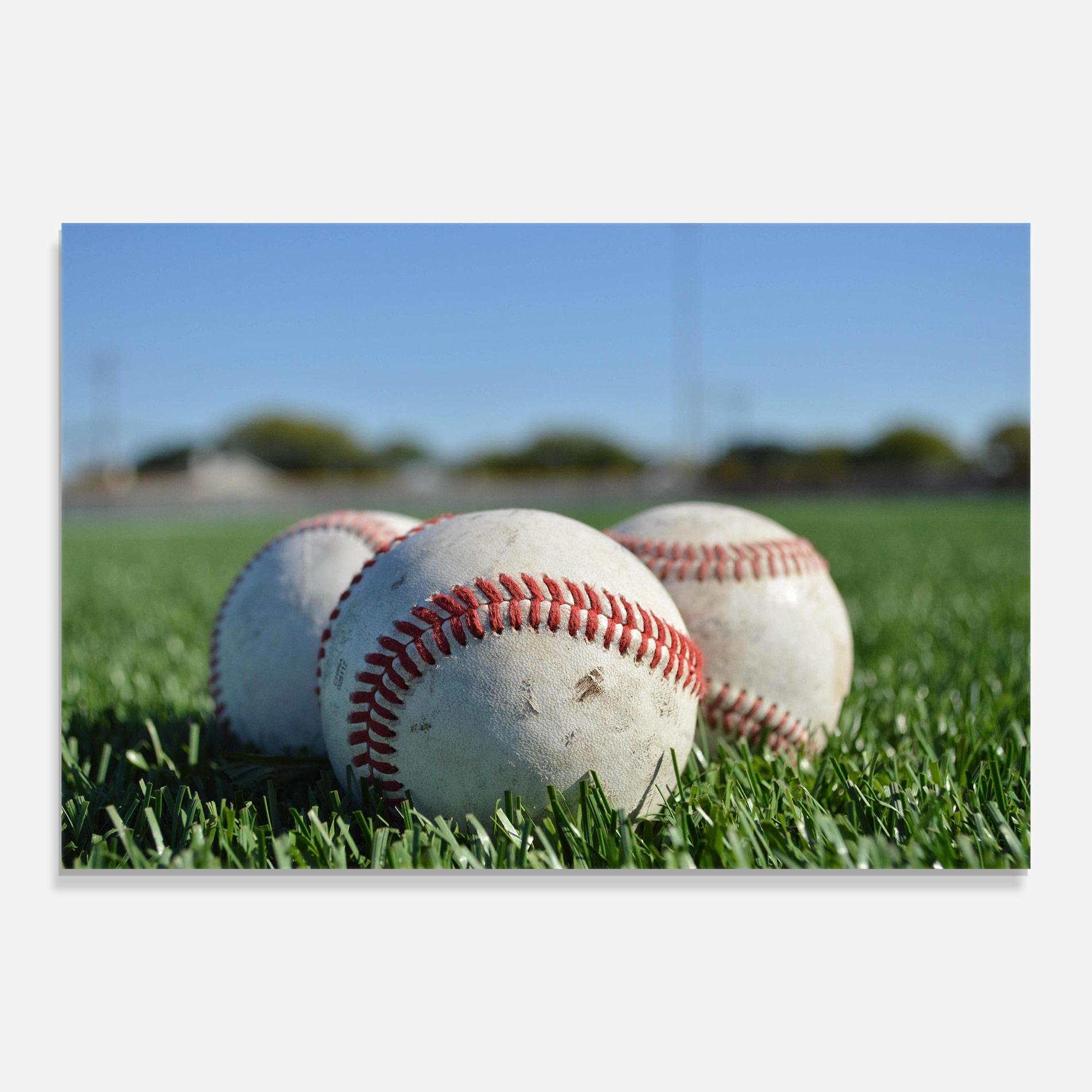 Glasbild Baseball Ball In Grass mockup 0