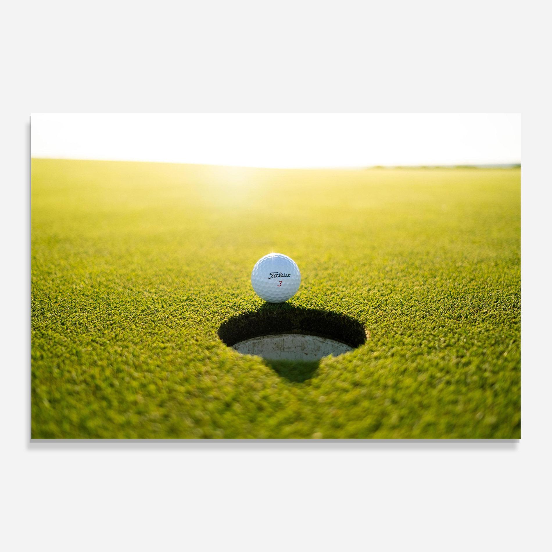 Glasbild Golf Ball Close To Fall mockup 0